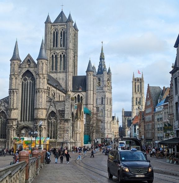 Historic city street with cathedrals, ideal for Short Term Property Management in tourist-heavy areas.